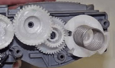 Toner cartridge gears.